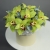 Композиция в шляпной коробке из 11 лаймовых орхидей в Красноармейске Композиция в шляпной коробке из 11 лаймовых орхидей в Красноармейске